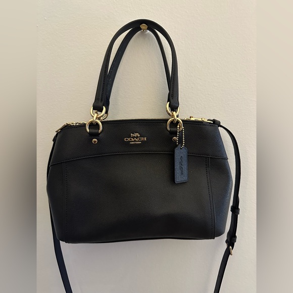 Coach Handbags - Coach small leather handbag with detachable strap.